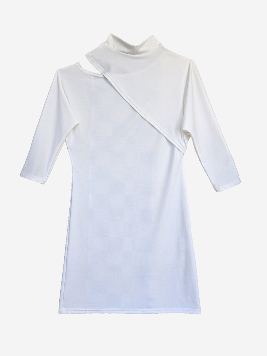 Back view of white jersey designer dress with split dolman sleeves, original print, and mock turtleneck.