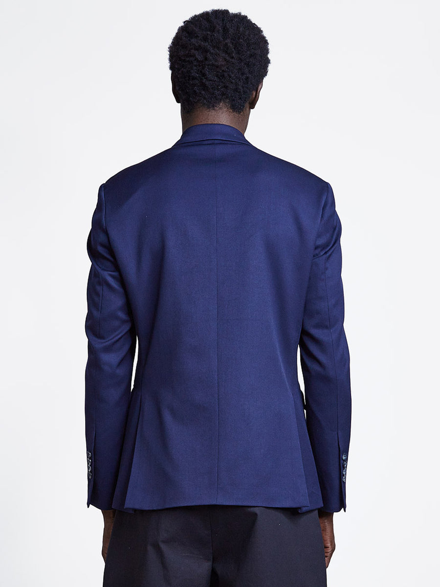 Wrap blazer jacket in navy for men with cord tie.