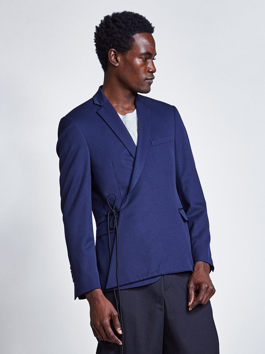 Wrap blazer jacket in navy for men with cord tie.