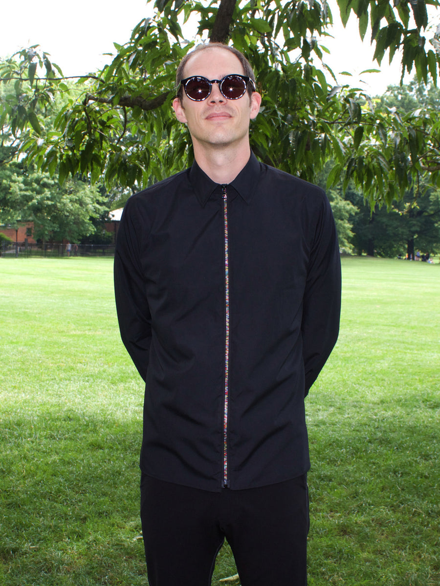 Mens black cotton collared shirt with rainbow zipper.