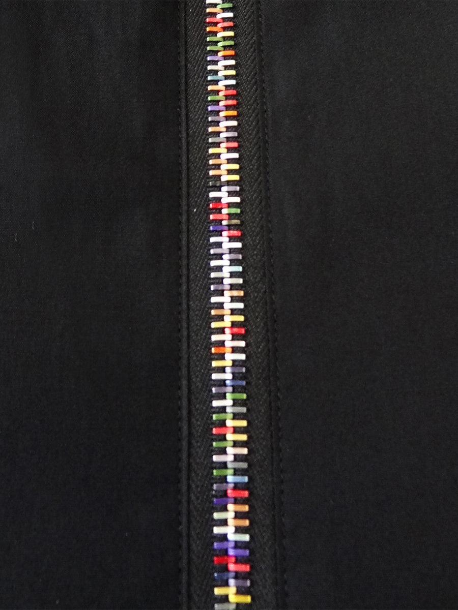Detail of rainbow zipper on zipper shirt