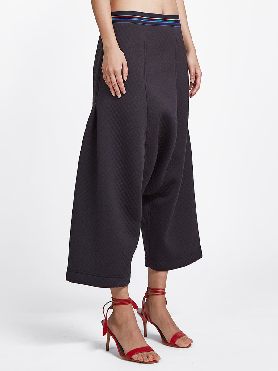 Unisex drop crotch pants in bubble neoprene with striped elastic waistband