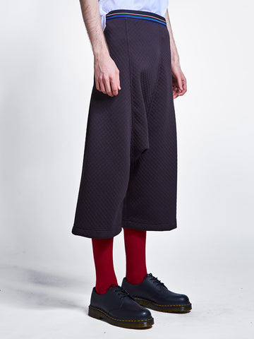 Drop crotch pant in bubble neoprene and striped elastic waistband.