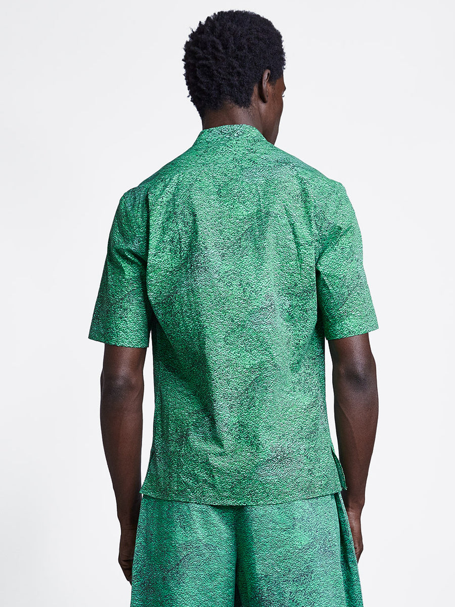 Loop placket short sleeve men's shirt in green print on model