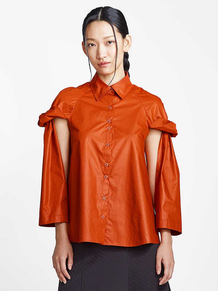 burnt orange topsy turvy shirt with exposed arms