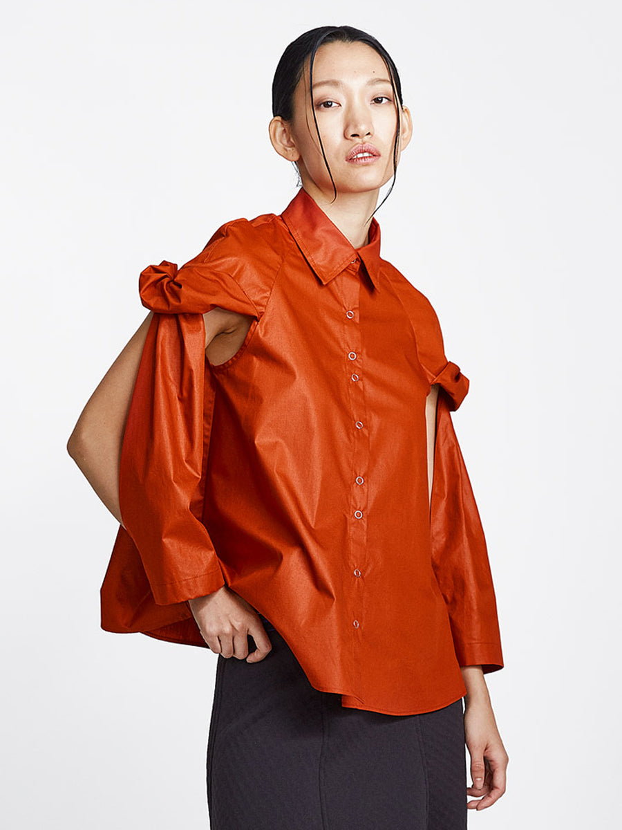 burnt orange topsy turvy shirt with exposed arms