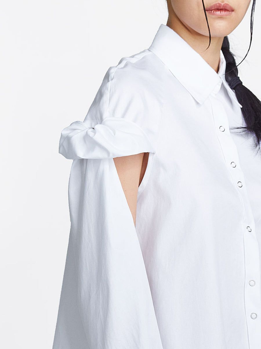white cotton topsy turvy shirtdress with exposed arms