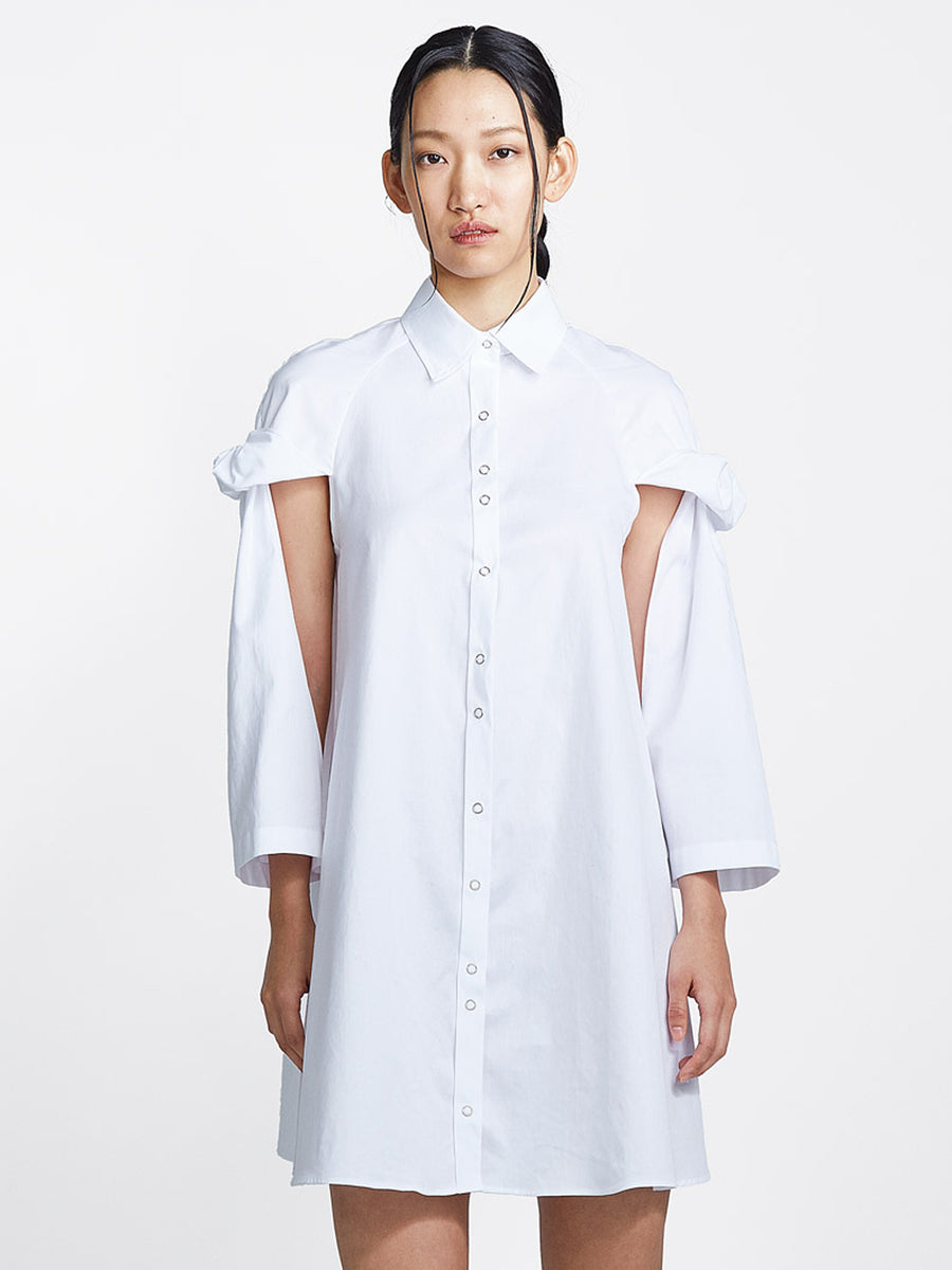 white cotton topsy turvy shirtdress with exposed arms