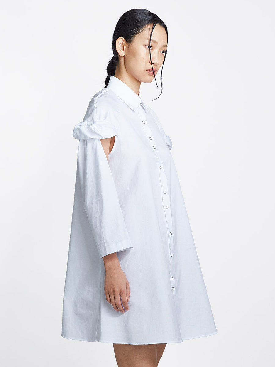 white cotton topsy turvy shirtdress with exposed arms